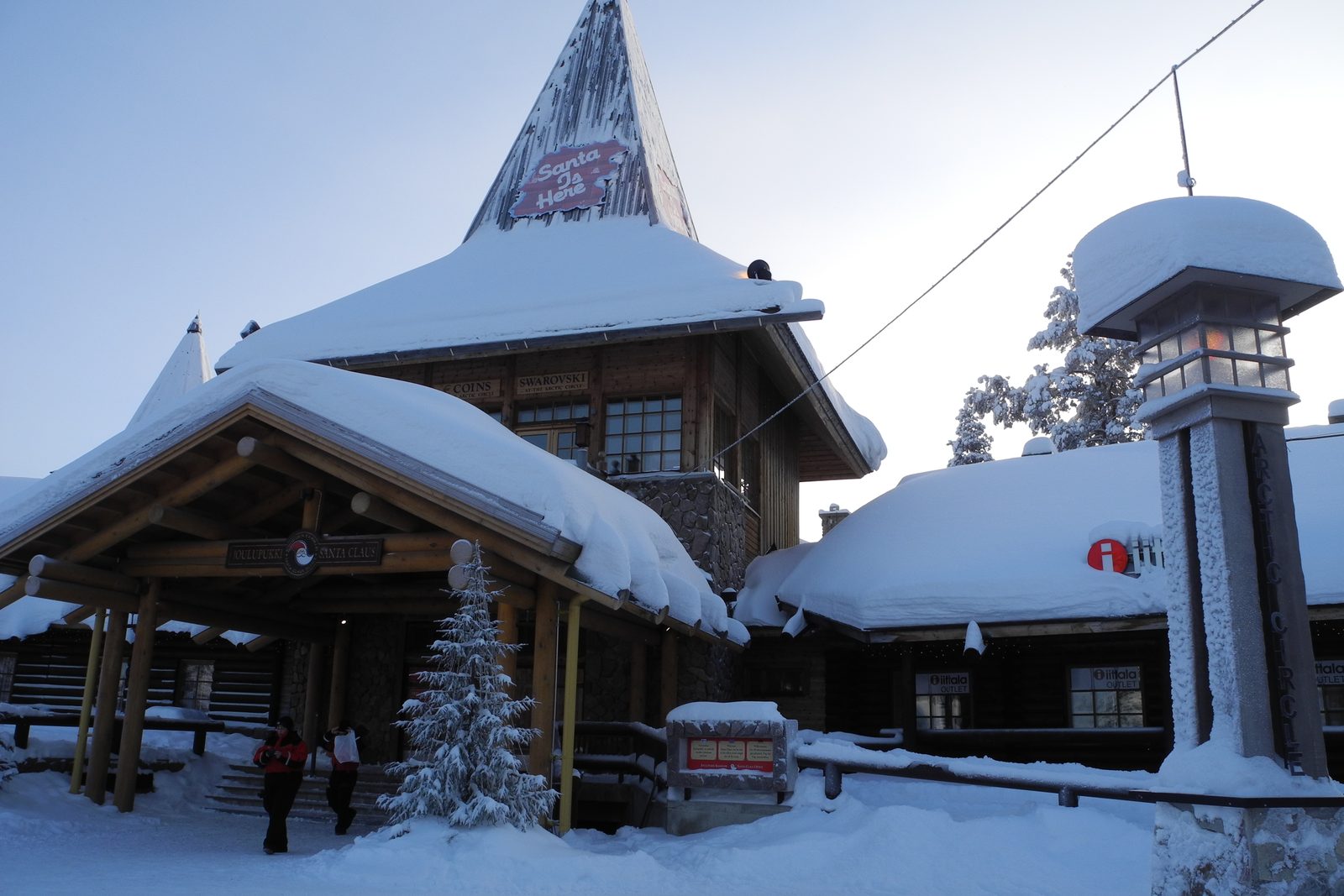 The snow-covered main building of Santa Claus Village on the Arctic Circle in winter